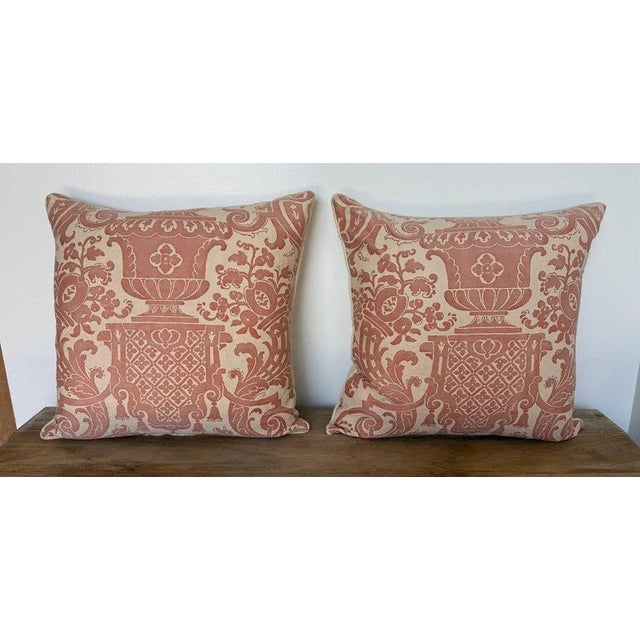 A resplendent pair of custom-made pillows by Melissa Levinson, featuring the iconic Fortuny “Carnavalet” textile. The...