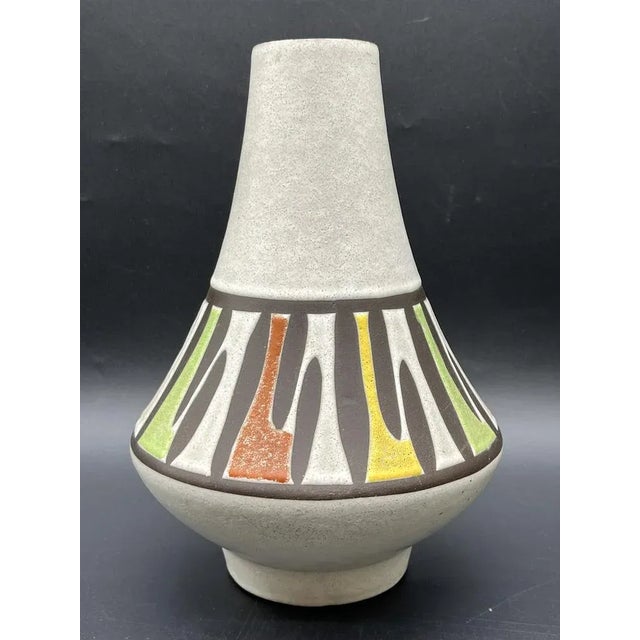 This exceptional ceramic vase with a handle dates from the 1950s and was designed by Egon Klein for the Jopeko...