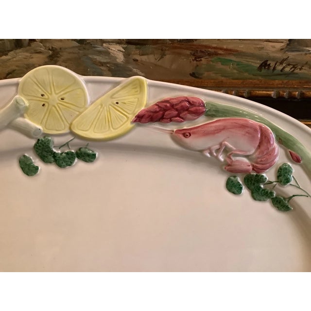 Elevate your table with this eye-catching vintage Fitz & Floyd large serving platter, featuring a vibrant shrimp, lemons,...