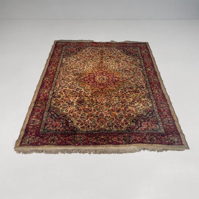 Middle Eastern modern red and beige rug, 1980s Rectangular Persian rug in dark-colored fabric with floral motifs, typical...