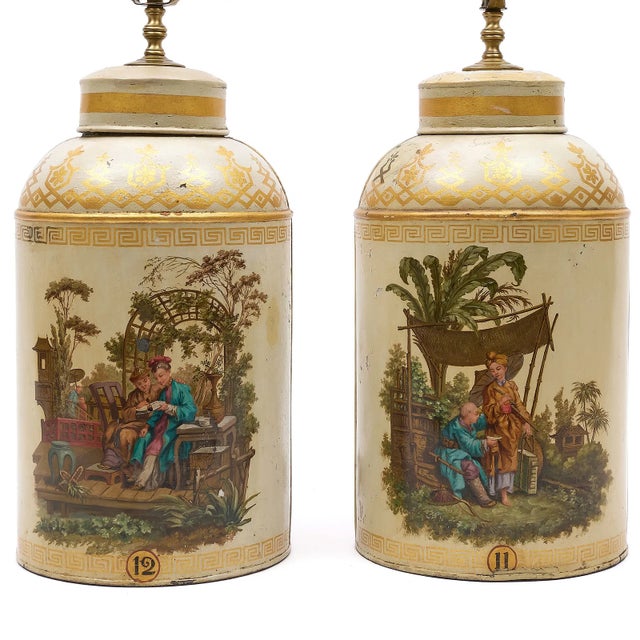 A true pair of large-scale English tea canisters, numbered and richly decorated in the chinoiserie taste--unusual in both...