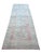Vintage Turkish rug, hand-knotted in Turkey from 100% wool. Measuring 4’5” x 11’9”, the rug features a traditional...