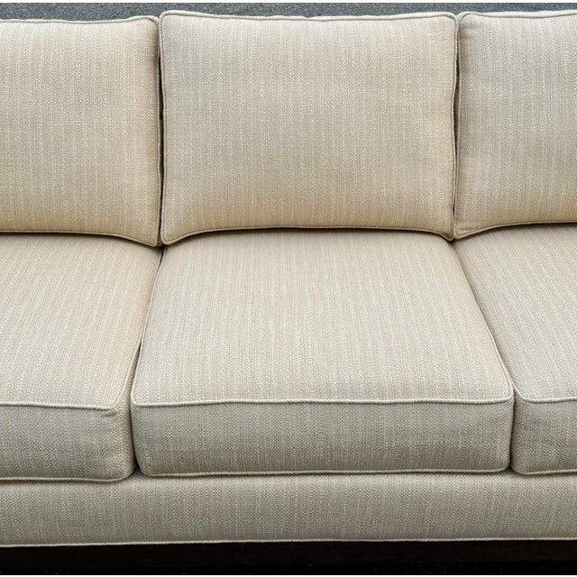 Comfort abounds in this perfectly scaled, contemporary seating collection. A signature wood base with tapered legs anchors...