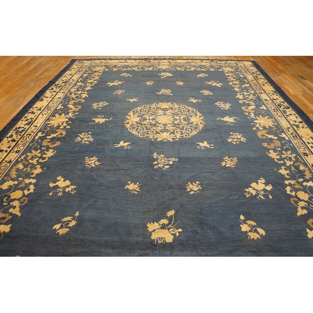 Antique Chinese - Peking Wool Blue Rug, Country of Origin: China, Circa Date: 1880s. This magnificent example of Chinese...