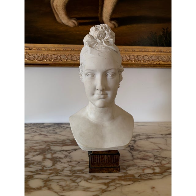 Beautiful white bisque bust of Empress Marie-Louise (1791-1847) second wife of Napoleon I. She was an Austrian forced to...