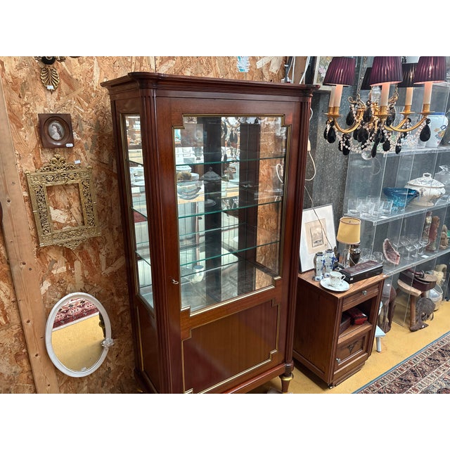 Elegant french neoclassical display cabinet by maurice hirsch, stamped “m. Hirsch”. crafted in mahogany and mahogany...
