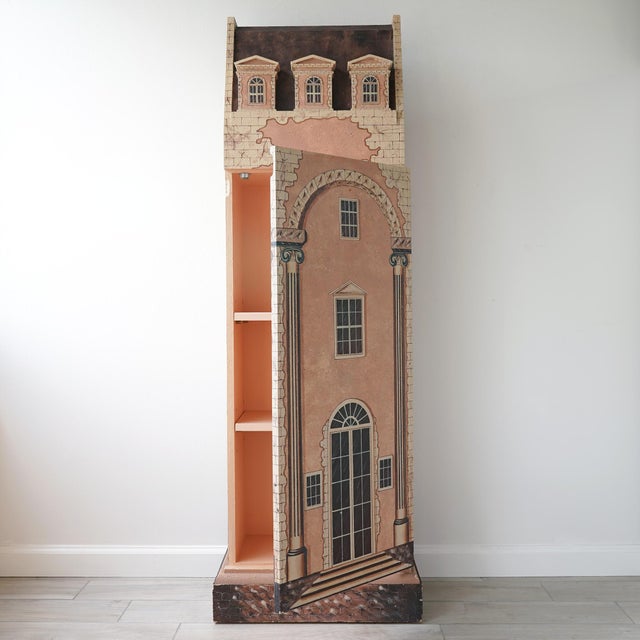 Vintage mid 20th century Maitland-Smith cabinet that is hand painted with a trompe l'œil motif of a Georgian townhouse....