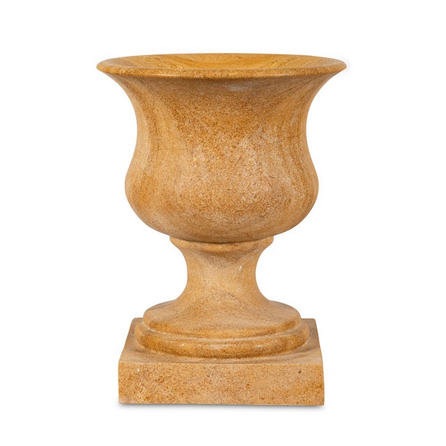 With its sweeping lip and balanced curvature, the vase captures the quiet elegance of classical antiquity. Its...