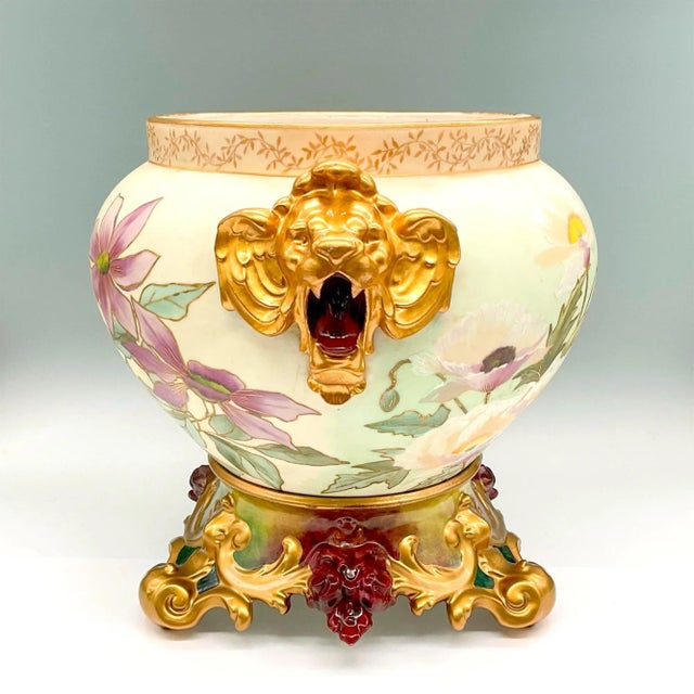 Introducing a stunning Mid 20th Century French Limoges porcelain jardiniere and base set. This exquisite ensemble...
