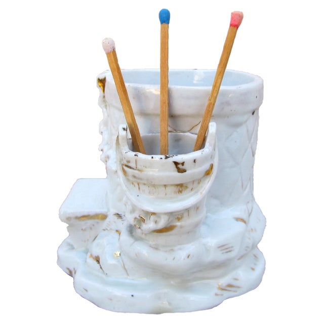 White and gilt porcelain wishing well match strike / humidor. Two compartments, one large and one small with a striking...