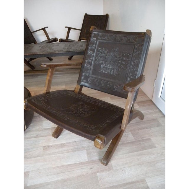 Very rare complete seating group from Angel I. Pazmino Manufacturer: Muebles de Estilo, consisting of 3 armchairs a table...