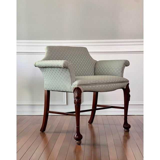 Carved mahogany bench with pale blue celadon upholstery and ball and claw feet, early 20th century. Wonderful petite bench...