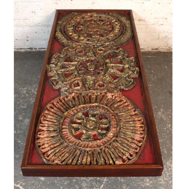 Artist-made coffee table with textured resin design under glass. A unique "goop" circles give a three dimensional look....