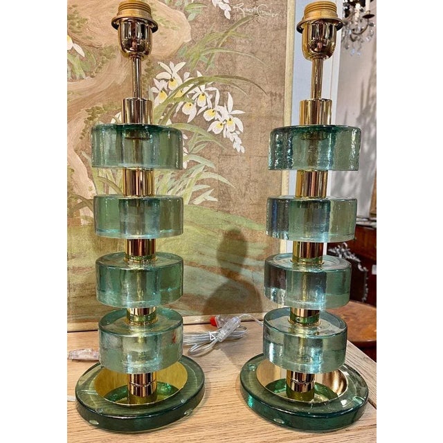 Great pair of Murano disc form glass and brass lamps in "Fontana Green". Perfect for today's transitional designs!