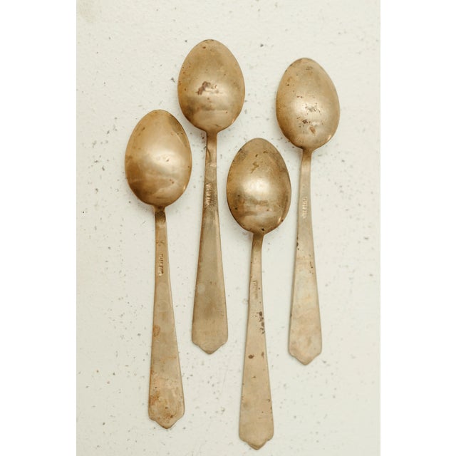 Description A rare and elegant set of four antique teaspoons dating to circa 1850. Each spoon features a blue enamel...
