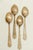 Description A rare and elegant set of four antique teaspoons dating to circa 1850. Each spoon features a blue enamel...
