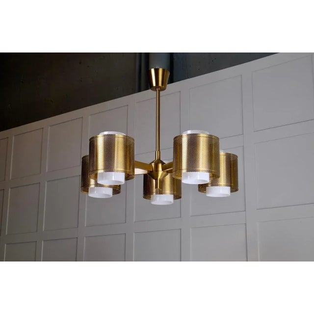 Rare model, produced in Sweden by Westal, 1960s. Perforated brass and acrylic shades. Please note: height is adjustable...