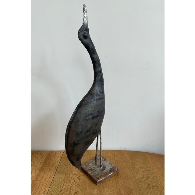 This statue captures the iconic, slender, "silent fisher" silhouette of a heron poised at the edge of your fish pond or...