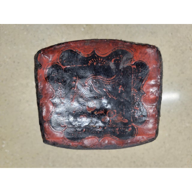 This exceptional antique Chinese headrest is expertly hand-crafted from stretched pigskin hide built over a contoured...