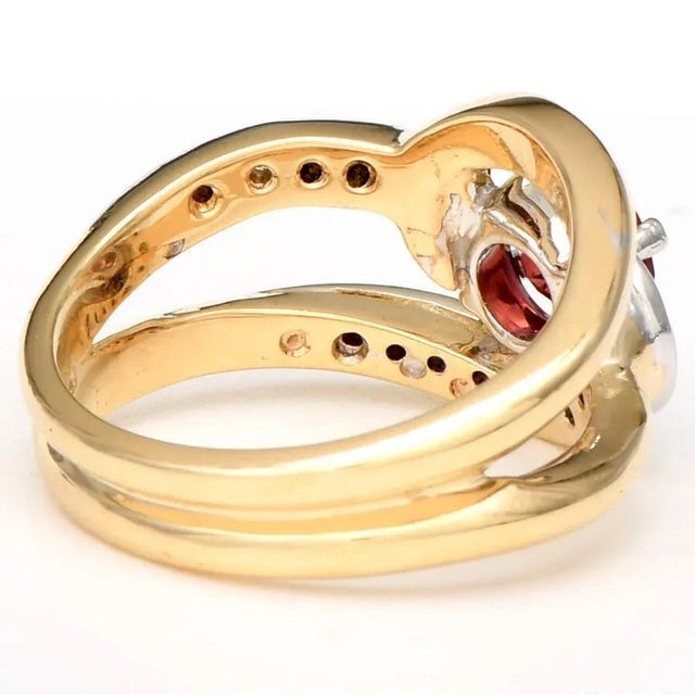 Give them something to gaze at with the curved style of this 14K gold bypass ring. Sweeping bands join together to wrap a...