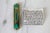 Vintage brass and green epoxy Mezuzah Hen Holon with scroll. No makers mark. Age wear. Hardware not included.