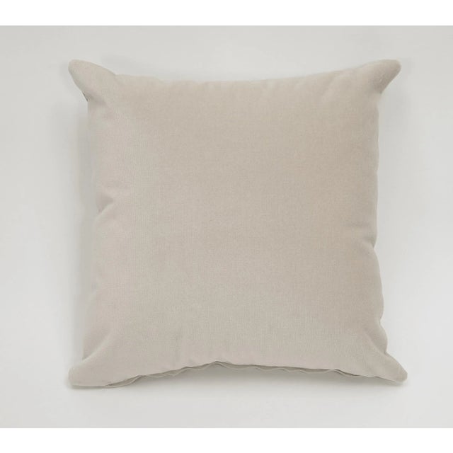 Made in the USA with a printed Italian leather. The back side is a soft cotton velvet. It has a fiber insert