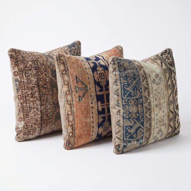 This 24'' x 24'' & 22'' x 24'' & 23'' x 23'' pillow cover set was made from authentic Turkish rug pieces — faded...