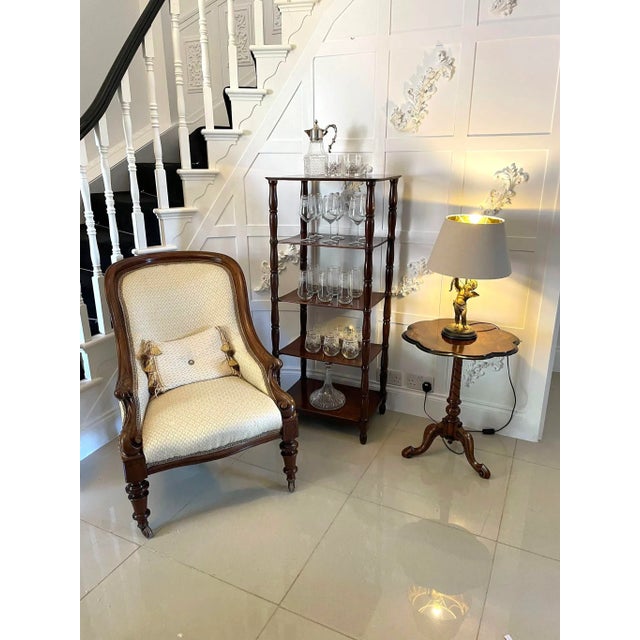 Antique william iv mahogany freestanding five-tier whatnot with five mahogany tiers supported by four unusual, elegant...