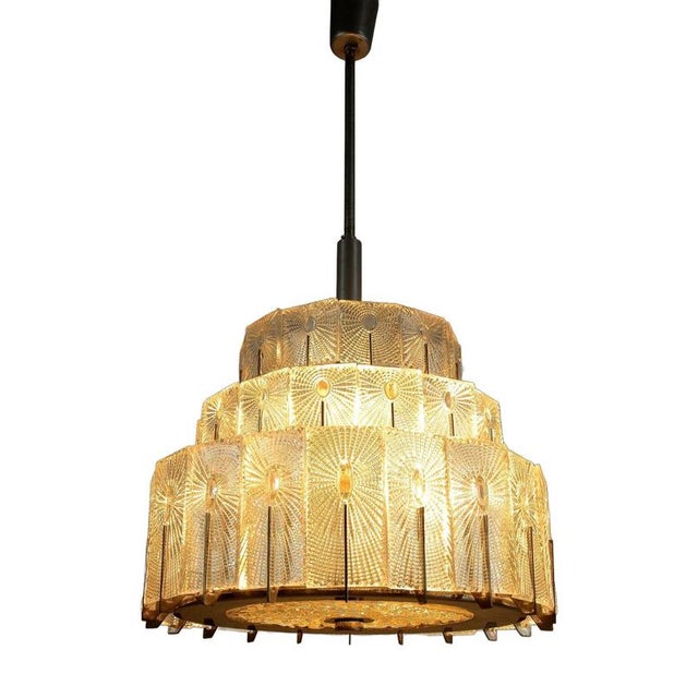 Extraordinary, rare 20th century three-tier glass chandelier made in Vienna/ Austria by the renowed company of Rupert...