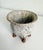 Funky mid-century studio pottery planter with four organic-shaped feet. Red clay body with off-white and brown glaze....