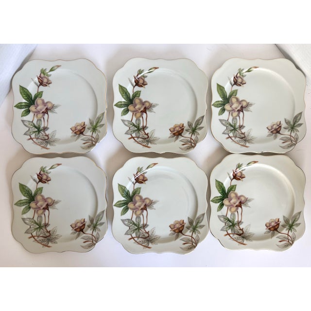 This charming set of six vintage porcelain salad/luncheon plates was made in Japan by Meito China, likely dating to the...