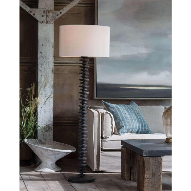 Textured bands ripple down the graduated column of our sculptural Fishbone floor lamp. Corrugated birch wood is...