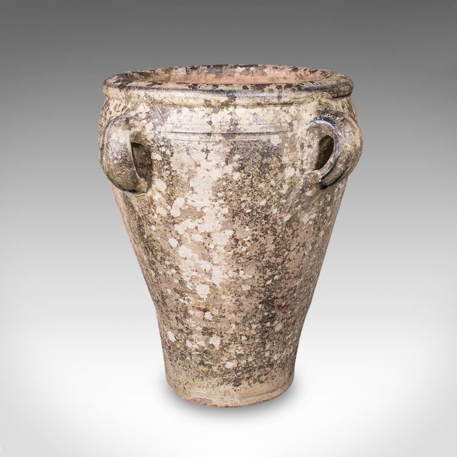 This is an antique weathered Tuscan planter. An Italian, terracotta ornamental garden accent, dating to the late Victorian...