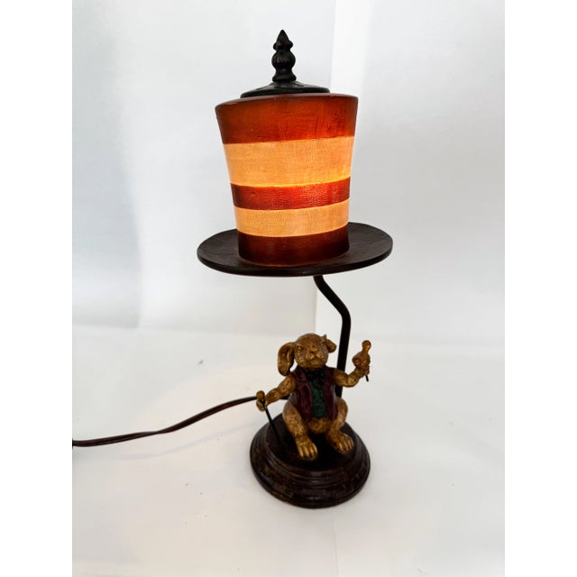 Unique Alice in Wonderland Rabbit with Hat lamp. Excellent condition and detailed workmanship. Casts a warm glow from low...