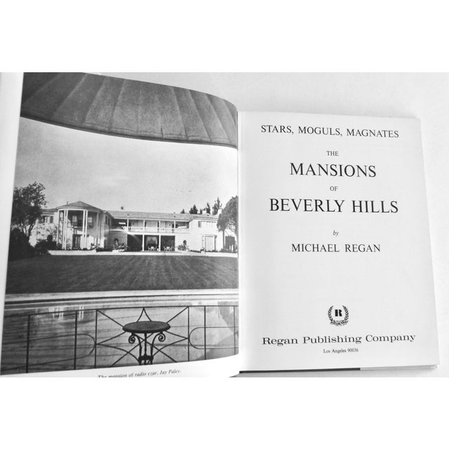 A rare, vintage (1966) book featuring b/w photos of Mansions in Beverly Hills. Written by Michael Regan, the 80-page...