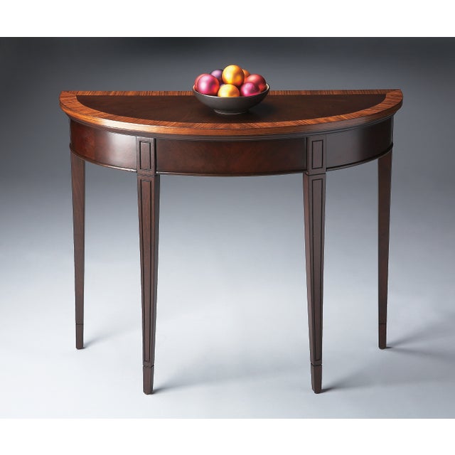 With simple lines, traditional styling and demilune shape, this elegant console table will enhance your space for years to...