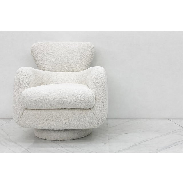 Vladimir Kagan for Directional “Papa Bear” Wingback Swivel Lounge Circa 1980s There are chairs… and then there are...
