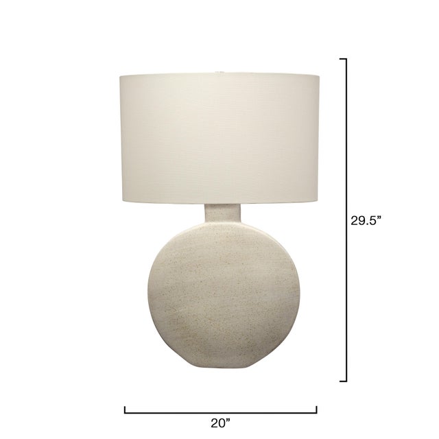 Moon Table Lamp, Cream Ceramic This ceramic lamp has an easy neutral palette, sleek sculptural lines, and a celestial...