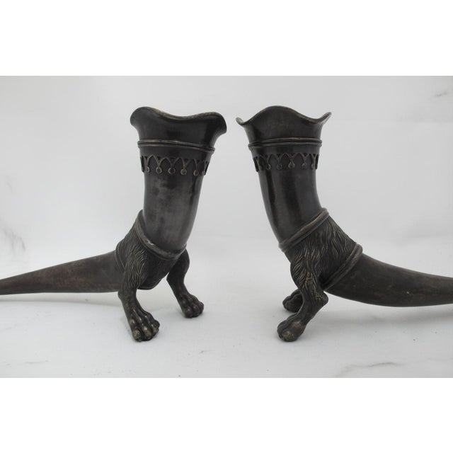 Pair of Rhytons, an ancient horn-shaped vessel traditionally used for drinking or pouring ritual libations. These are...