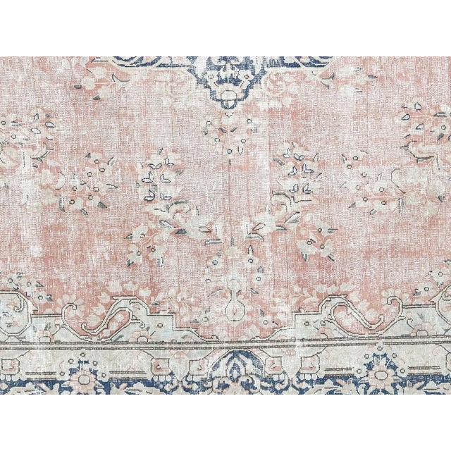 1950s Persian Kerman Carpet. Hand woven in the Kerman region of Iran. Distressed and refinished in the U.S. The Persian...