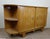 According to Jules Leleu: Rare corner buffet in light wood from the Art Deco period circa 1930. opening on the front with...