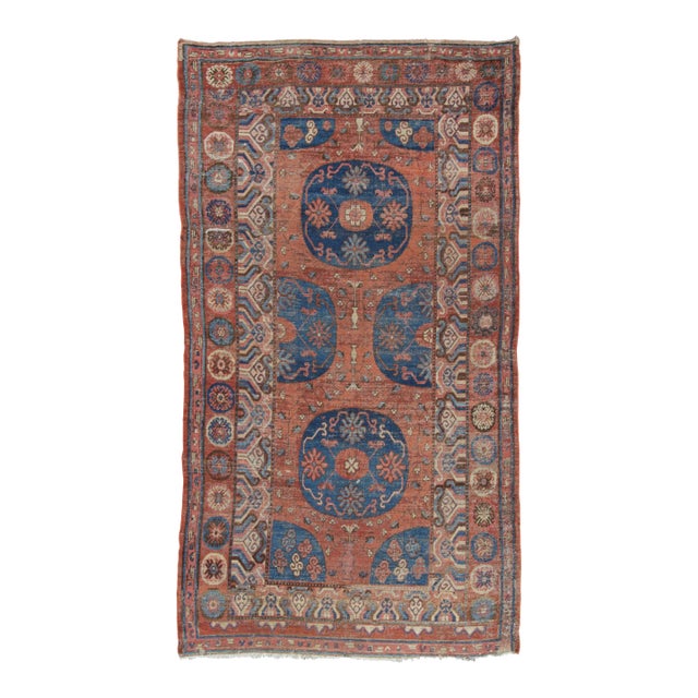 Antique Khotan Rug With Blue Medallions and Colorful Florals - Rug & Kilim For Sale
