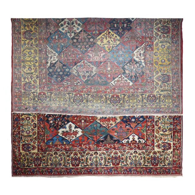 This central Persian Char Mahal district village scatter shows a Scali form escutcheon pattern in ecru, red, navy medium...