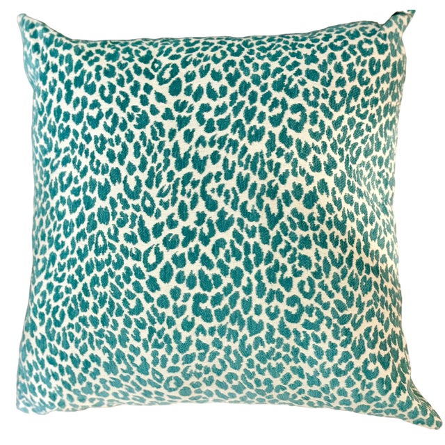 Custom 22" pillows in a Kravet aqua/ivory cheetah fabric. Tapered corners and hidden zipper. Includes feather/down...