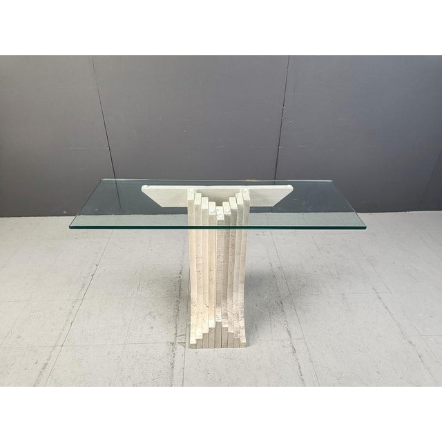Wonderful architectural travertine console table in the manner of Carlo Scarpa. Beautiful timeless look. Good condition....