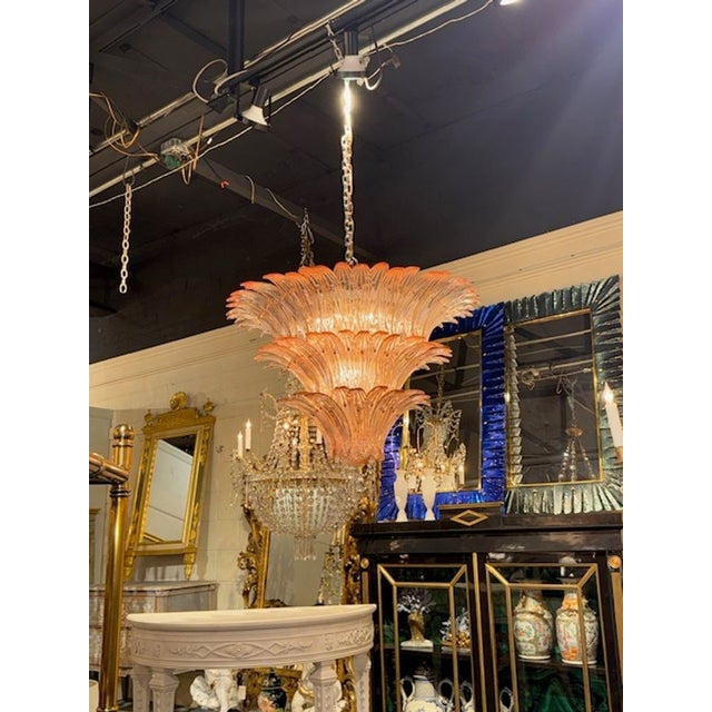 Gorgeous modern Murano glass 'palmette" chandelier in a pale pink. A glistening beauty that makes a real impact! 23h x 32w