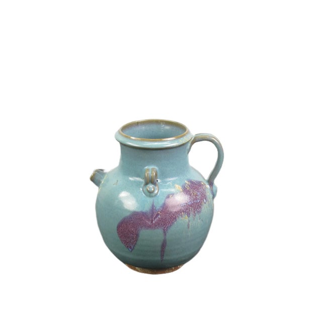 This beautiful blue and purple ceramics water jar is handcrafted with meticulous care of combining bold hues and subtle...