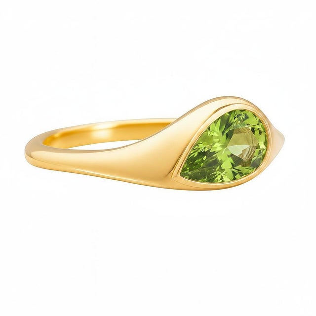 Pear Peridot East-West Ring. Peridot Solitaire Ring. Metal: 14k yellow gold Weight: 2.2 g, depends on size. Main stone:...