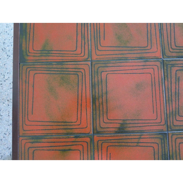 An unusual tile top coffee table by Bramin Mobler, Denmark, dated 1970.