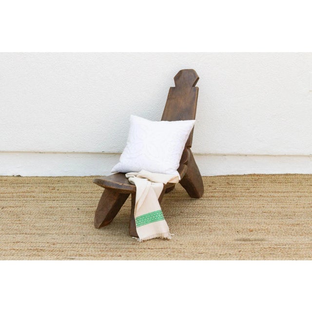 A lovely artifact, this primitive chair was carved for the "Noble" in the Lobi tribe. This piece is beautifully carved...